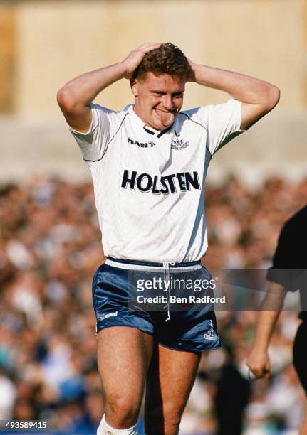 Tottenham player Paul Gascoigne sticks out his tongue during a Division One match between Tottenham Hotspur and Manchester United at White Hart Lane...