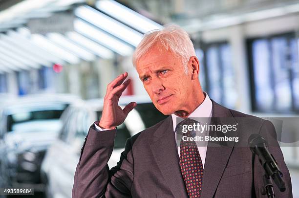 Matthias Mueller, chief executive officer of Volkswagen AG , pauses during a news conference after meeting with employees on the VW Golf automobile...