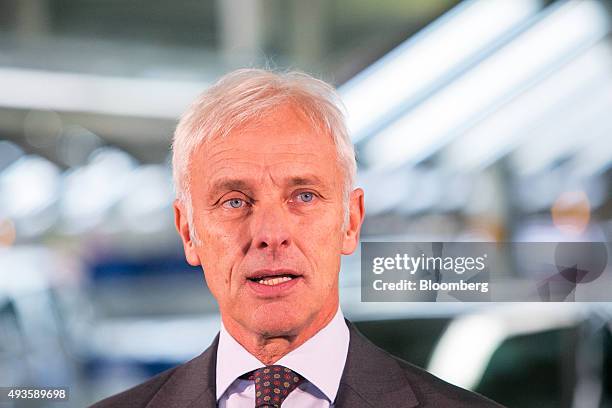 Matthias Mueller, chief executive officer of Volkswagen AG , speaks during a news conference after meeting with employees on the VW Golf automobile...