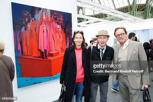 Chief Editor of Beaux Arts magazine, Fabrice Bousteau standing between Journalist Guillaume Durand and his wife Diane de MacMahon attend the 'FIAC...