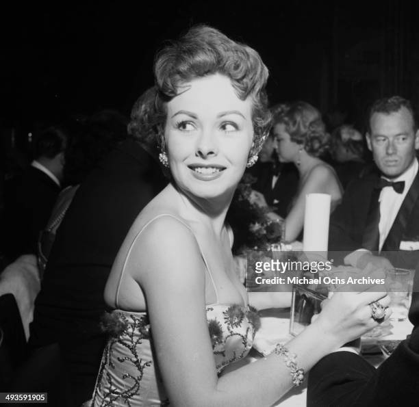 Actress Jeanne Crain at dinner at Mocambo's in Los Angeles, California.