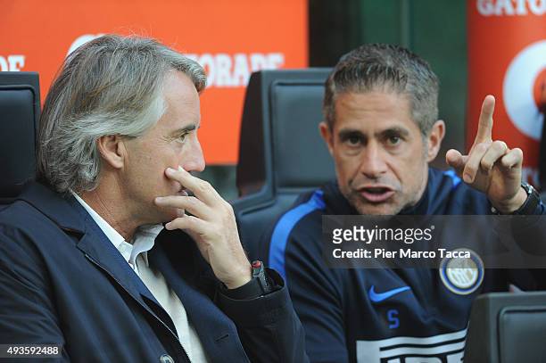 Head coach of FC Internazionale Roberto Mancini and Sylvio Mendes Campos Junior known as Sylvinho during the Berlusconi Trophy match between AC Milan...