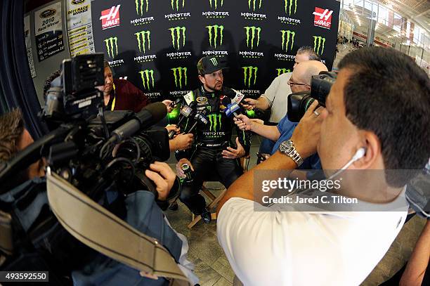 Kurt Busch, driver of the Stewart-Haas Racing Chevrolet, answers questions from the media during a press conference announcing Monster Energy as a...