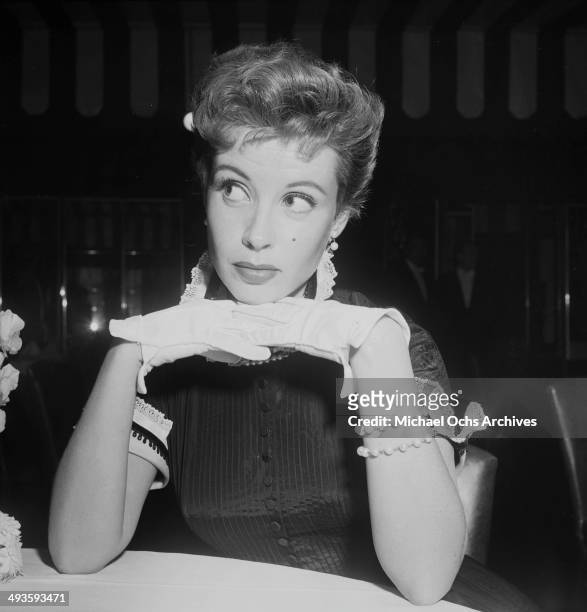 Actress Gloria DeHaven attends the Joan Crawford Fashion Show in Los Angeles, California.