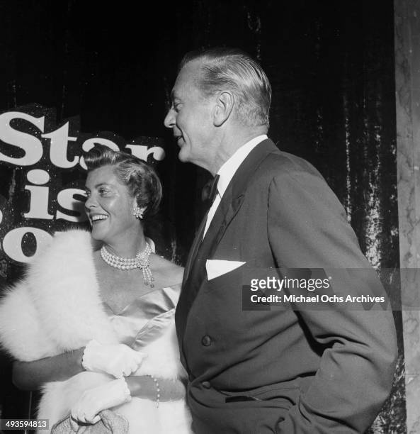 Actor Gary Cooper and his wife Veronica Balfe attend a party in Los Angeles,California.