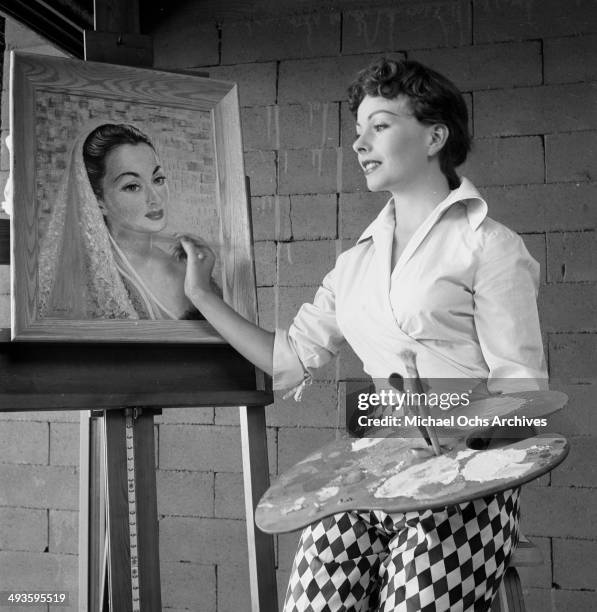 Actress Jeanne Crain poses at home in Los Angeles, California.