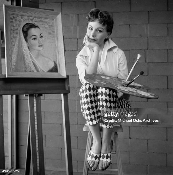 Actress Jeanne Crain poses at home in Los Angeles, California.