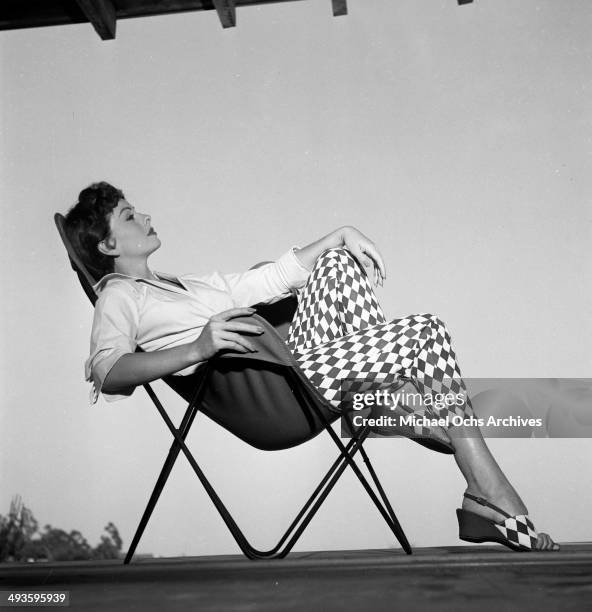 Actress Jeanne Crain poses at home in Los Angeles, California.