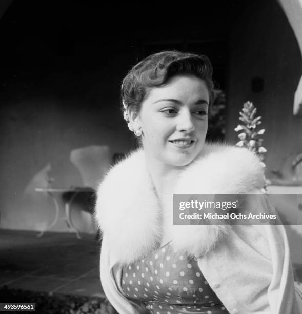 Actress Jeanne Crain poses at home in Los Angeles, California.