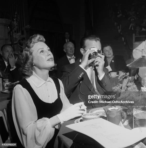 Director Dick Powell and actress June Allyson attend attends the Oscar Nominations in Los Angeles, California.