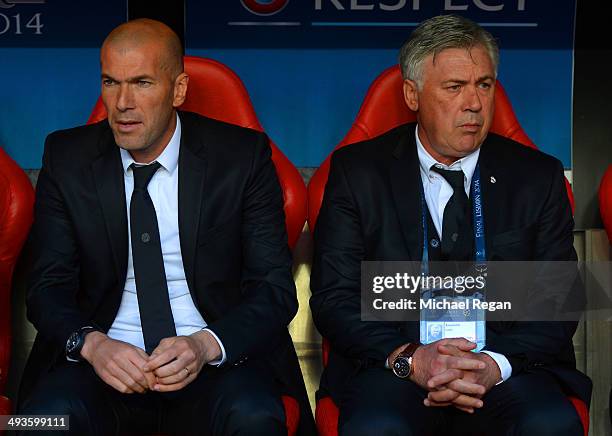Assistant coach Zinedine Zidane of Real Madrid and Head Coach, Carlo Ancelotti of Real Madrid look on during the UEFA Champions League Final between...