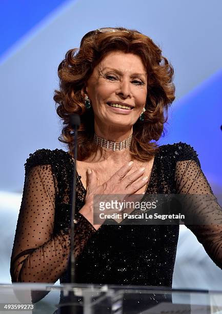 Actress Sophia Loren appears on stage to present The Grand Prix award during the Closing Ceremony at the 67th Annual Cannes Film Festival on May 24,...
