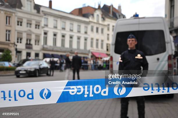 Belgian police take security precautions on Rue Des Minimes as three people were killed and another was seriously wounded in a gun attack Saturday at...