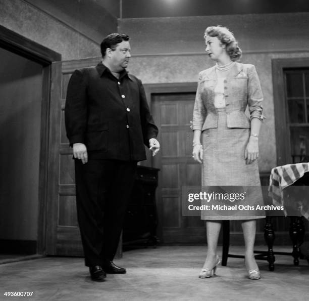 Actress Audrey Meadows and actor Jackie Gleason on stage during the rehearsal of the "The Jackie Gleason Show" in Los Angeles, California.