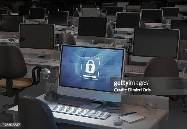 computer in dark office, password entry required - password protection stock pictures, royalty-free photos & images