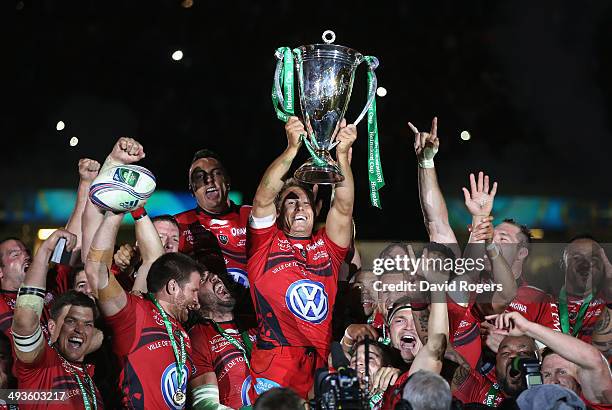 Jonny Wilkinson the Toulon captain, raises the Heineken Cup as his team mates celebrate after their victory during the Heineken Cup Final between...