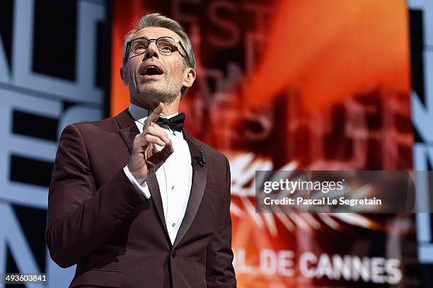 Lambert Wilson speaks on stage during the Closing Ceremony at the 67th Annual Cannes Film Festival on May 24, 2014 in Cannes, France.