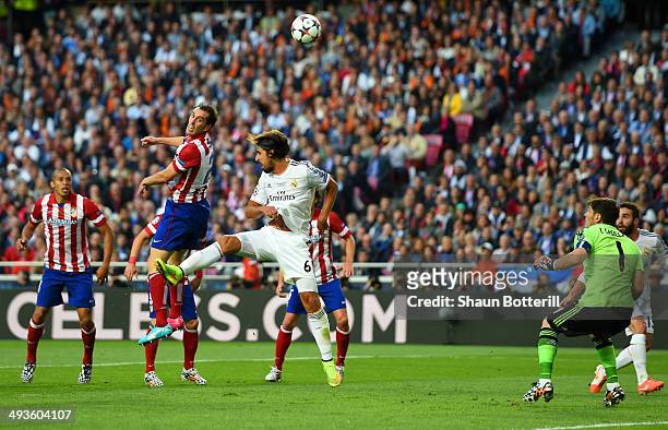 Diego Godin of Club Atletico de Madrid heads in the first goal during the UEFA Champions League Final between Real Madrid and Atletico de Madrid at...