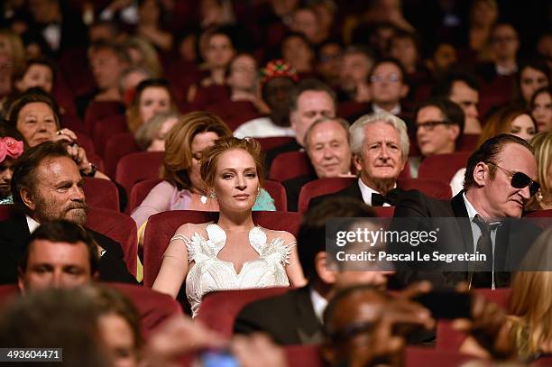 Uma Thurman and Quentin Tarantino sit in the audience during the Closing Ceremony at the 67th Annual Cannes Film Festival on May 24, 2014 in Cannes,...