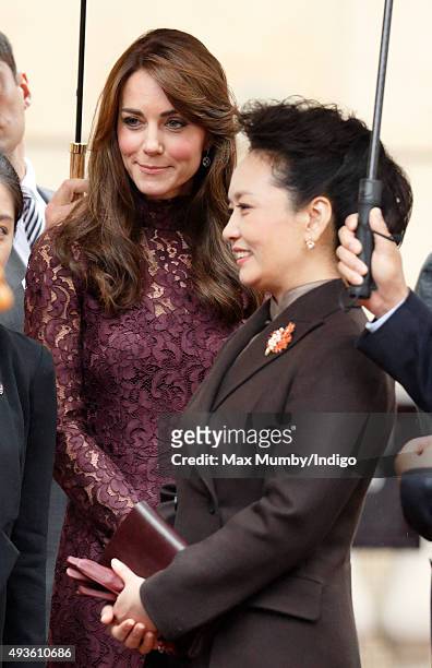 Peng Liyuan and Catherine, Duchess of Cambridge attend 'Creative Collaborations: UK & China' at Lancaster House on October 21, 2015 in London,...