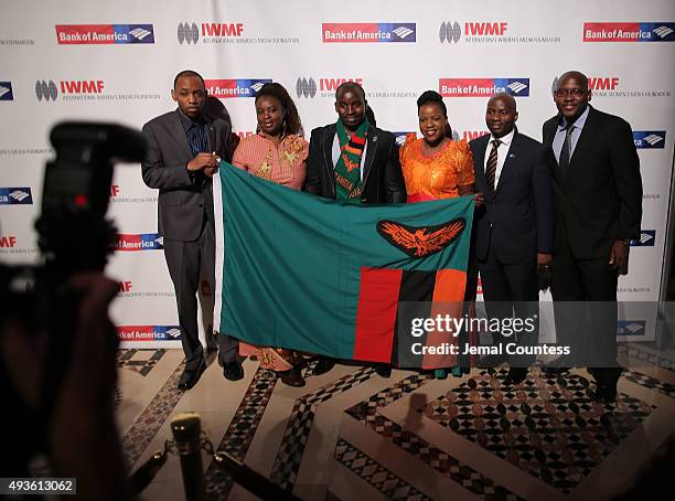 Mainza Kangombe, Nchimunya Mweemba, Simeon Kumwenda, Mwape Kumwenda, Chibaula Silwamba and guest attend the International Women's Media Foundation's...