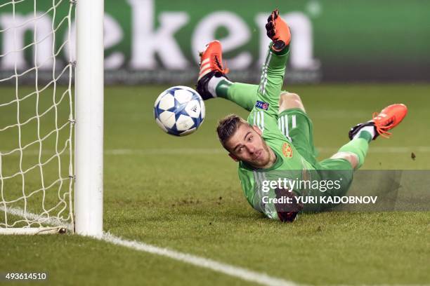 Manchester United's Spanish goalkeeper David De Gea fails to stop a goal during the UEFA Champions League group B football match between PFC CSKA...