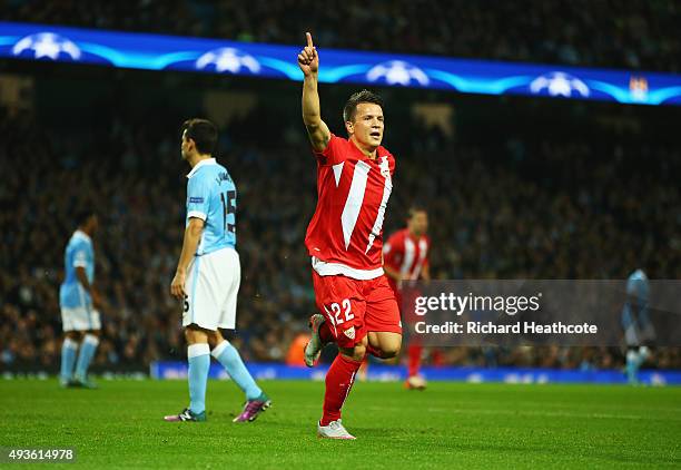 Yevhen Konoplyanka of Sevilla celebrates scoring the opening goal during the UEFA Champions League Group D match between Manchester City and Sevilla...