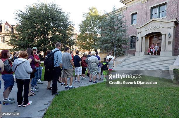 Fans line up to get picture taken on the steps of Hill Valley Courthouse in the back lot of Universal Studios during "Back To The Future" day October...