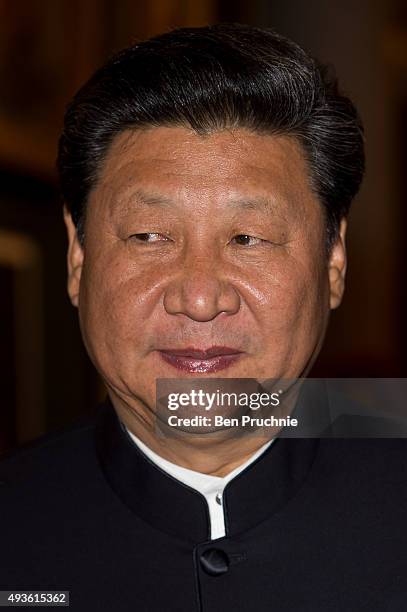 President of the People's Republic of China Xi Jinping poses for photographers during the Lord Mayors banquet at The Guildhall on October 21, 2015 in...