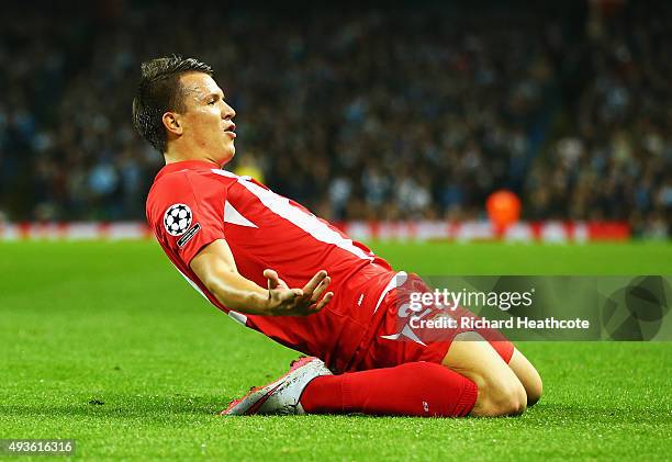 Yevhen Konoplyanka of Sevilla celebrates scoring the opening goal during the UEFA Champions League Group D match between Manchester City and Sevilla...