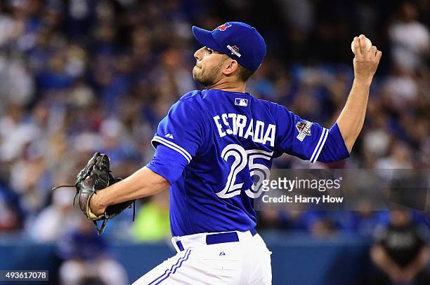 Marco Estrada of the Toronto Blue Jays throws a pitch in the first inning against the Kansas City Royals during game five of the American League...