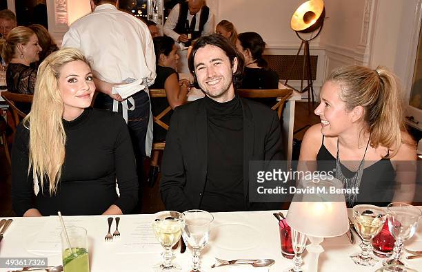 Tamsin Egerton, Guy Pewsey and Laura Seward-Smith attend the Baccarat/1 Hotel Dinner at One Horse Guards on October 21, 2015 in London, England.