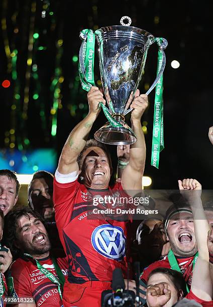 Jonny Wilkinson the Toulon captain, raises the Heineken Cup as his team mates celebrate after their victory during the Heineken Cup Final between...