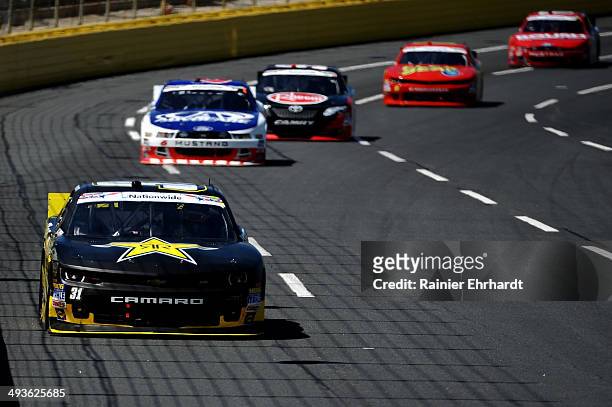 Dylan Kwasniewski, driver of the Rockstar Chevrolet, leads a pack of cars during the NASCAR Nationwide Series History 300 at Charlotte Motor Speedway...