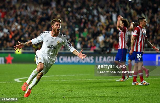 Sergio Ramos of Real Madrid celebrates scoring their first goal in stoppage time during the UEFA Champions League Final between Real Madrid and...
