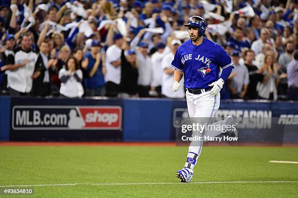 Chris Colabello of the Toronto Blue Jays runs the bases after hitting a solo home run in the second inning against the Kansas City Royals during game...