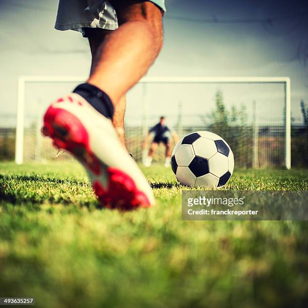 soccer player at the penalty - shootout stock pictures, royalty-free photos & images