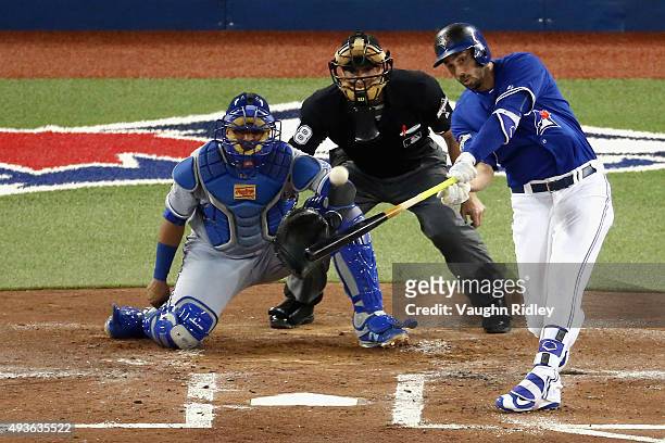 Chris Colabello of the Toronto Blue Jays hits a solo home run in the second inning against the Kansas City Royals during game five of the American...