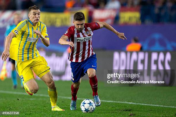 Guilherme Madalena Siqueira of Atletico de Madrid competes for the ball with Aleksei Schetkin of FC Astana during the UEFA Champions League Group C...