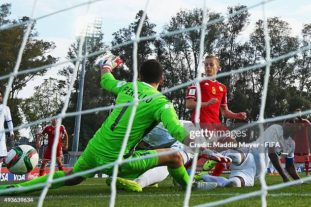 Dante Rigo of Belgium scores against Michael Perello of Honduras during the FIFA U-17 World Cup Chile 2015 group D match between Belgium and Honduras...