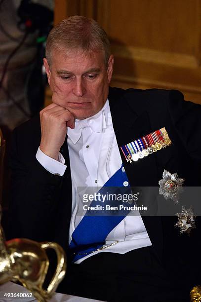 Prince Andrew, Duke of York listens to President Xi Jinping of the People's Republic of China speaks during the Lord Mayors banquet at The Guildhall...