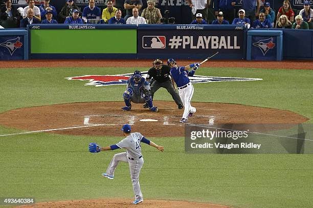 Troy Tulowitzki of the Toronto Blue Jays hits a three-run RBI double in the sixth inning against the Kansas City Royals during game five of the...