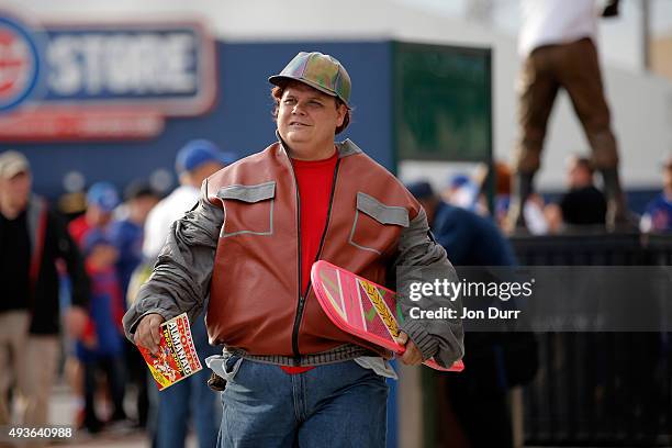 Chicago Cubs fan dressed as a "Back to the Future's" Marty McFly walks outside the stadium prior to game four of the 2015 MLB National League...