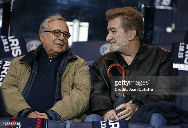 Daniel Hechter and Eddy Mitchell attend the UEFA Champions League match between Paris Saint-Germain and Real Madrid at Parc des Princes stadium on...