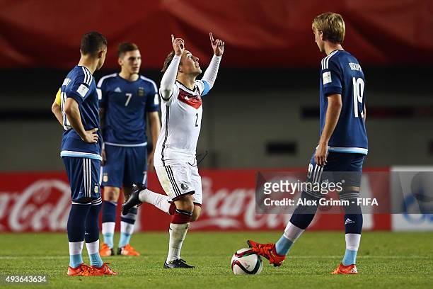 Felix Passlack of Germany celebrates his team's third goal as Tomas Conechny, Gianluca Mancuso and Matias Roskopf of Argentina react during the FIFA...