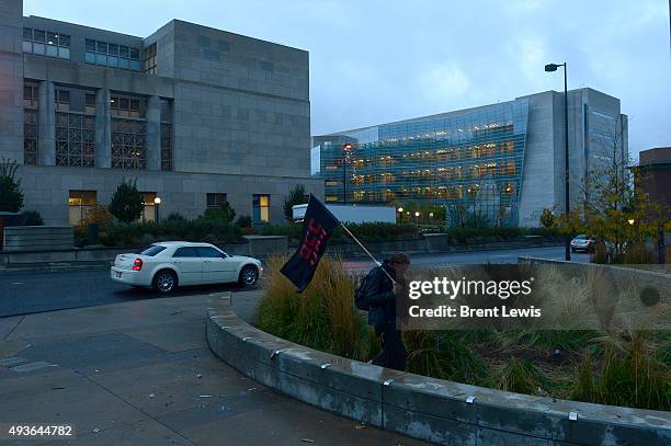 Austin Johnson walks around the area where Occupy Denver has been camped at for almost the last two months after police removed them from the site...