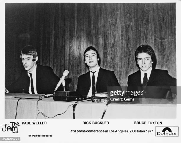 From left to right, Paul Weller, Rick Buckler and Bruce Foxton of The Jam at a press conference in Los Angeles, 7th October 1977.