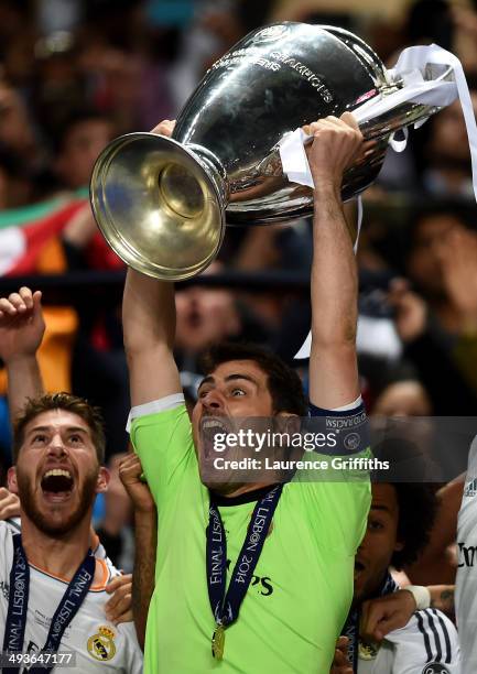 Iker Casillas of Real Madrid lifts the Champions League trophy during the UEFA Champions League Final between Real Madrid and Atletico de Madrid at...