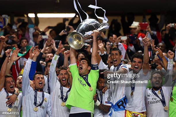 Iker Casillas of Real Madrid lifts the Champions League trophy during the UEFA Champions League Final between Real Madrid and Atletico de Madrid at...