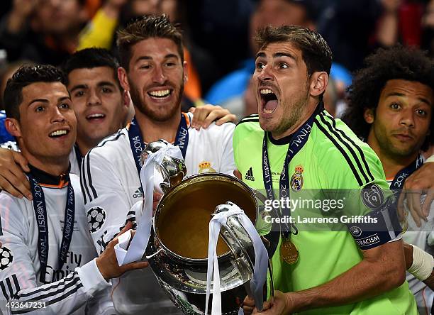 Iker Casillas of Real Madrid lifts the Champions League trophy during the UEFA Champions League Final between Real Madrid and Atletico de Madrid at...